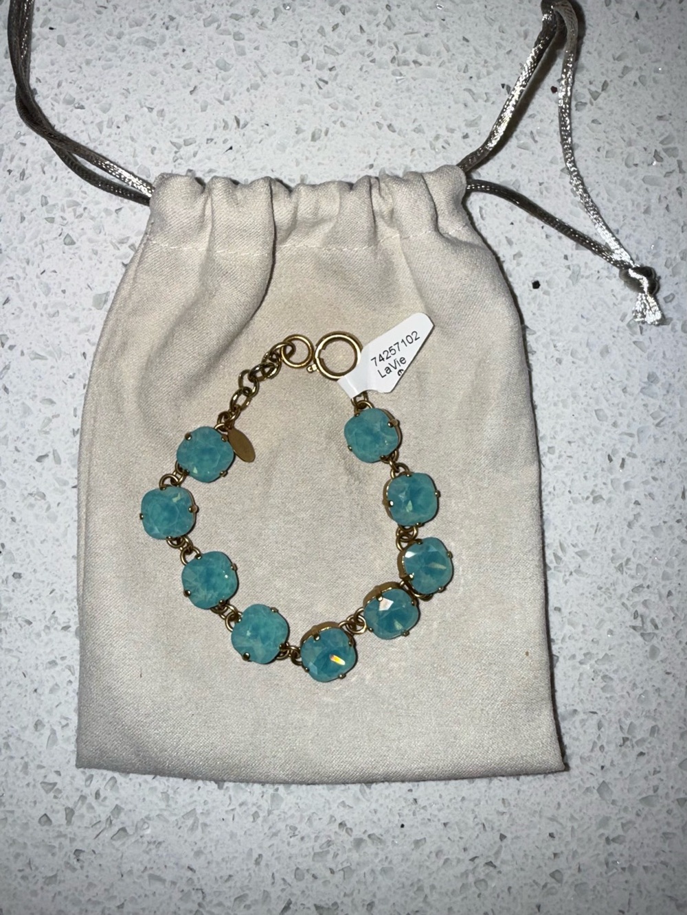 La Vie Gold Bracelet with Aqua Blue Faceted Stones